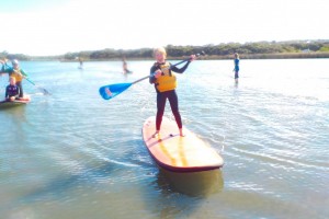 Kids learning to SUP on the Anglesea River